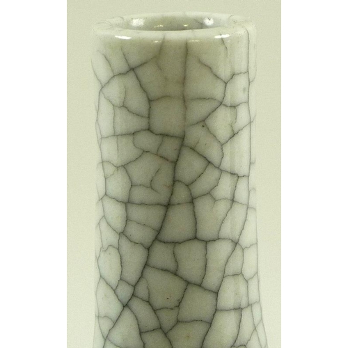 564 - A Chinese sang-de-boeuf bottle vase, early 20th century, unmarked, 8 by 15.5cm, together with a Chin... 