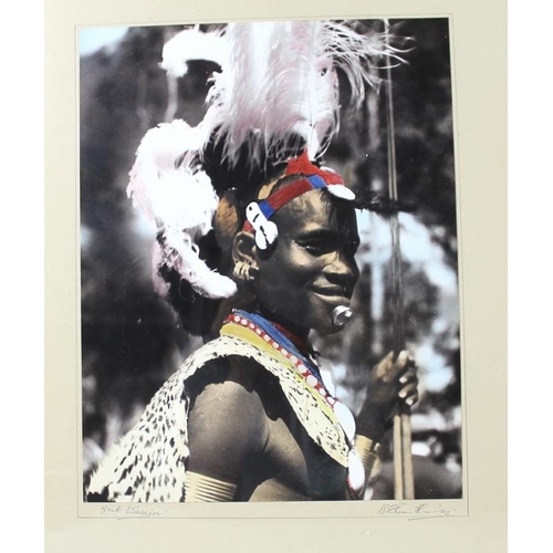 593 - A collection of three signed photographic prints of African ethnic tribal figures in traditional gar... 