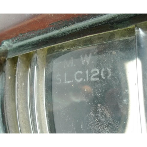 707 - A large copper ship's masthead lantern with bisected clear fresnel lens, by Meteorite, no. C30790, 2... 