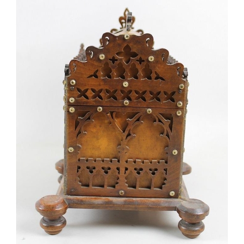 752 - A Victorian oak fretwork reliquary box, in Gothic taste, with lift lid enclosing purple velvet lined... 