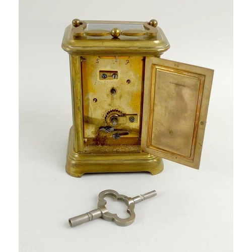 759 - A 19th century French brass carriage clock, with four bevelled glass panes, the white enamel face wi... 