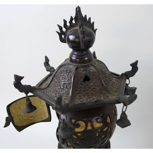 769 - A pair of early 20th century Chinese bronze freestanding lanterns, with removable hexagonal bell sha... 