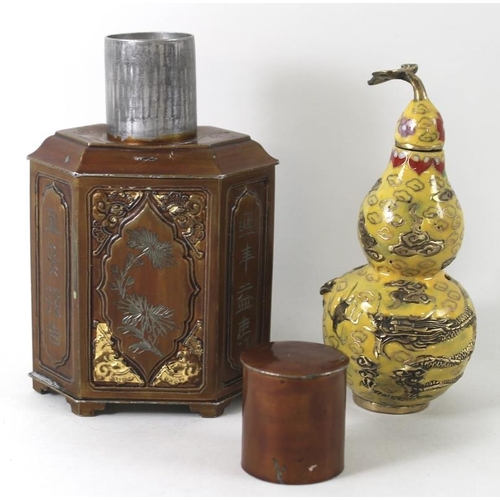 781 - An early 20th century Chinese hexagonal pewter tea caddy bronzed and gilded, decorated with calligra... 