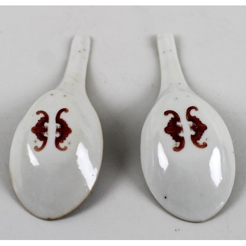 783 - Two Chinese Qing Dynasty, 19th century, porcelain spoons, each decorated with two cranes flying amon... 