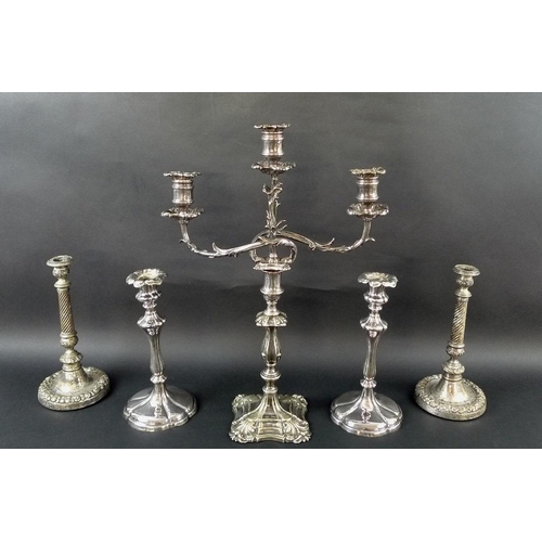 799 - An early 20th century silver plated three branch candelabra with cast leaf arms and curving lobes, a... 