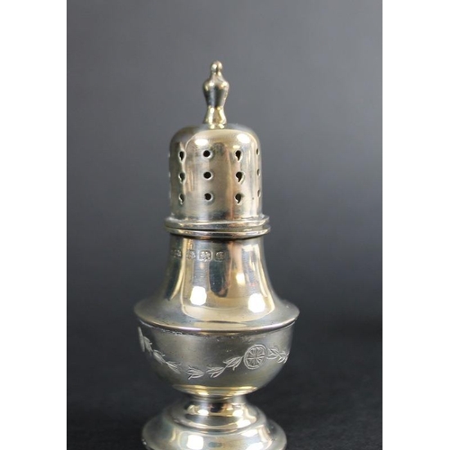 805 - A silver cruet set comprising a pair of pepperettes, 8cm, a pair of salt cellars with Bristol blue g... 