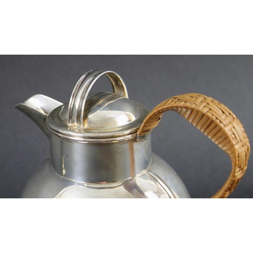 819 - A silver Guernsey creamer of conventional form with rattan wrapped handle, Birmingham 1929, Walker a... 