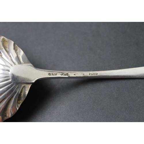 820 - A pair of George III Irish silver sauce ladles, with shell shaped bowls and engraved floral decorati... 