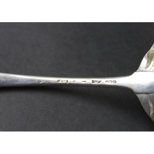 820 - A pair of George III Irish silver sauce ladles, with shell shaped bowls and engraved floral decorati... 