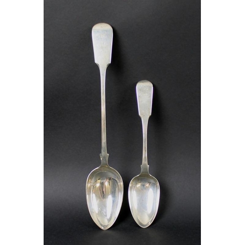 824 - Two 19th century silver fiddle pattern serving spoons, the larger with handle engraved AL to AL 1872... 