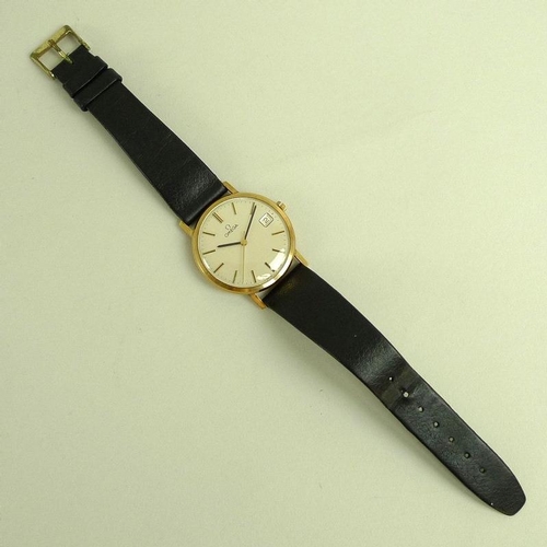 850 - An Omega 9ct gold cased gentleman's wristwatch, circa 1978, circular champagne enamel dial with gold... 