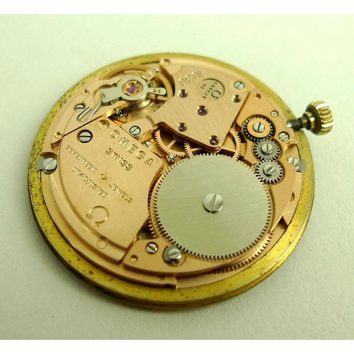 850 - An Omega 9ct gold cased gentleman's wristwatch, circa 1978, circular champagne enamel dial with gold... 