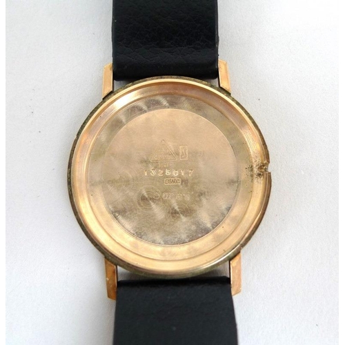 850 - An Omega 9ct gold cased gentleman's wristwatch, circa 1978, circular champagne enamel dial with gold... 