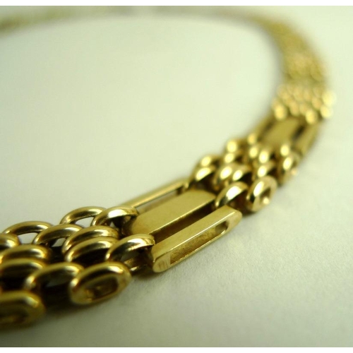 851 - A 9ct gold link and bar necklace, 42.5cm long, 35.5g.