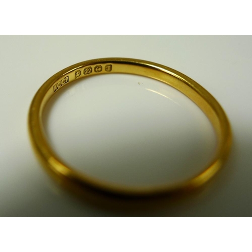 852 - A 22ct gold wedding band, size M, 5.9g, together with a further 22ct gold wedding band, size K, 1.6g... 