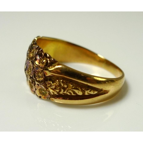 861 - An 18ct gold ring decorated with a garland of flowers, size M, 4.5g, and a 14ct gold ring, the swirl... 