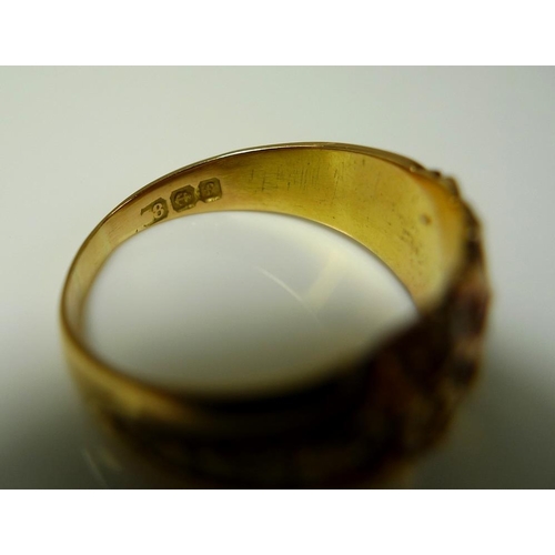 861 - An 18ct gold ring decorated with a garland of flowers, size M, 4.5g, and a 14ct gold ring, the swirl... 