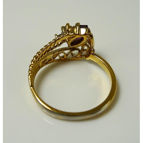 861 - An 18ct gold ring decorated with a garland of flowers, size M, 4.5g, and a 14ct gold ring, the swirl... 