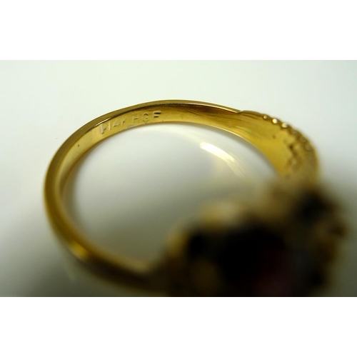 861 - An 18ct gold ring decorated with a garland of flowers, size M, 4.5g, and a 14ct gold ring, the swirl... 