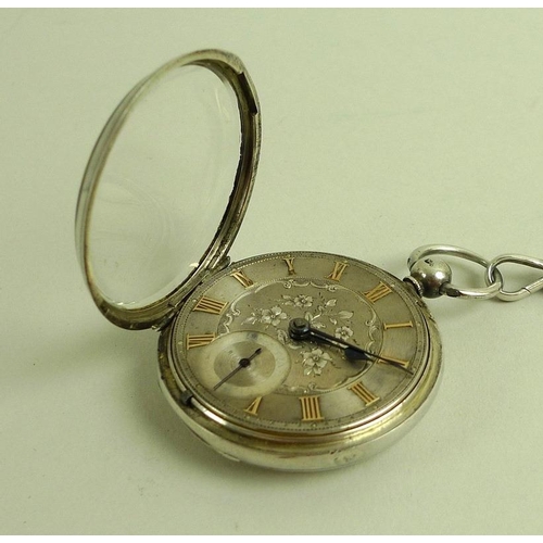 864 - A Victorian silver open faced pocket watch, key wind, engraved face with subsidiary seconds dial, go... 