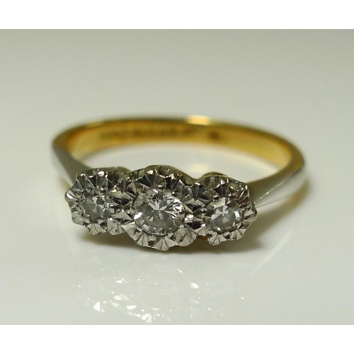 869 - An 18ct gold, platinum and diamond ring, illusion set, total diamond weight, approximately 0.1ct, si... 