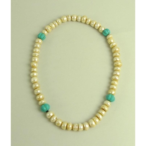 873 - A Chinese pearl and turquoise necklace, the fifty four large ringed pearls each approximately 11.2 t... 