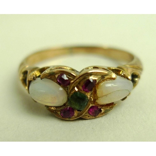 883 - An 18ct gold ring, of beaded design within border, cast as a row of bead forms set within a band, ma... 