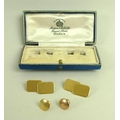 A pair of George VI 18ct gold chain link cufflinks, of canted rectangular form with textured finish,... 
