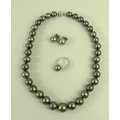 A string of Tahitian cultured black pearls with 18ct white gold and diamond set clasp, made up of th... 