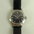 A WWII Eterna steel cased 'Dirty Dozen' military wristwatch, black dial with subsidiary seconds dial... 