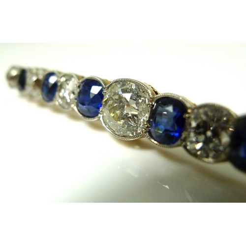 894 - A diamond, sapphire and 9ct gold bar brooch, early 20th century, with central 1.6ct round brilliant ... 