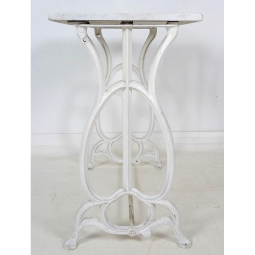 908 - A late 19th or early 20th century white marble topped table with cast iron base, likely originally a... 