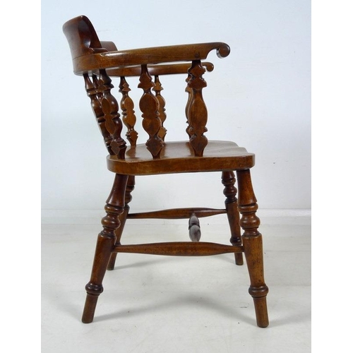 909 - A Victorian smokers bow chair, H stretcher, turned supports, 50 by 52 by 79cm high.