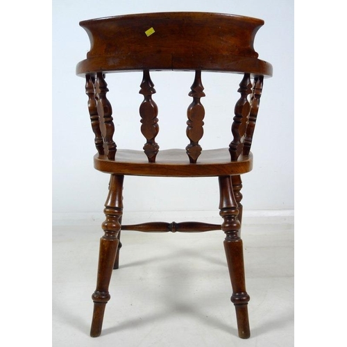 909 - A Victorian smokers bow chair, H stretcher, turned supports, 50 by 52 by 79cm high.