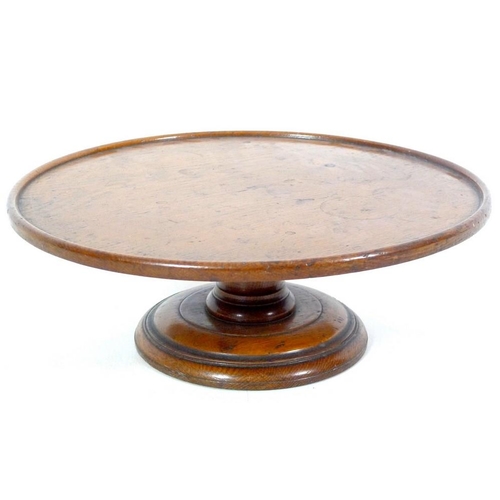 915 - A Victorian oak Lazy Susan, circular dished surface on a turned stepped circular base, 43.5 by 16.5c... 