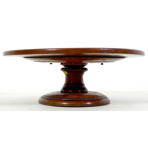 915 - A Victorian oak Lazy Susan, circular dished surface on a turned stepped circular base, 43.5 by 16.5c... 