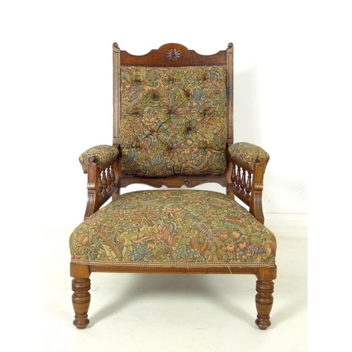 916 - A late Victorian mahogany armchair, with carved decoration, open baluster form arms, recently re-uph... 