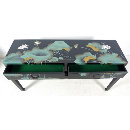 922 - A late 20th century Chinese black lacquer sideboard, with two drawers, decorated with flowers, 139.5... 