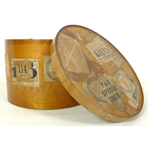 923 - An early 20th century bentwood travel case hat box, of oval section  with leather strap and carry ha... 