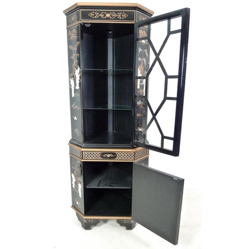 924 - A late 20th century Chinese black lacquer corner display cabinet, decorated with figures, 73 by 51.5... 