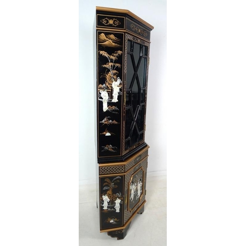 924 - A late 20th century Chinese black lacquer corner display cabinet, decorated with figures, 73 by 51.5... 