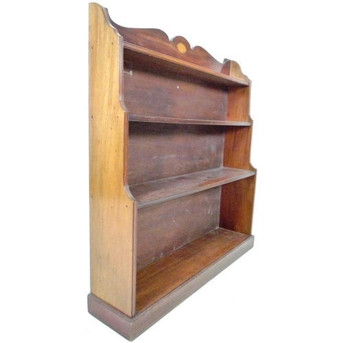 928A - An Edwardian mahogany waterfall freestanding bookcase, inlaid fan paterae decoration to the shaped g... 