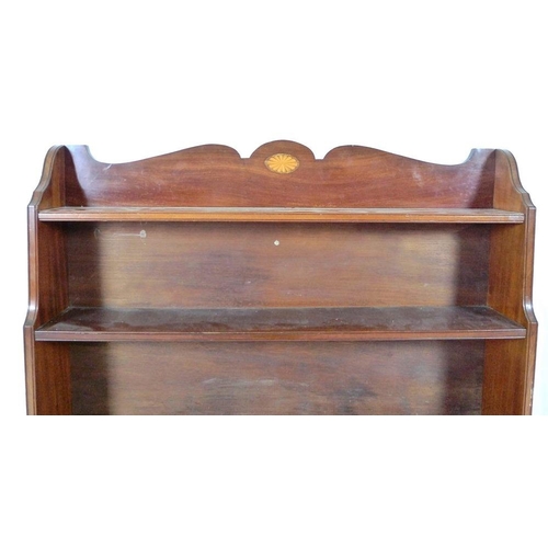 928A - An Edwardian mahogany waterfall freestanding bookcase, inlaid fan paterae decoration to the shaped g... 