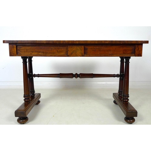 931A - An early Victorian mahogany desk, two frieze drawers, turned column supports and stretcher, glass pr... 