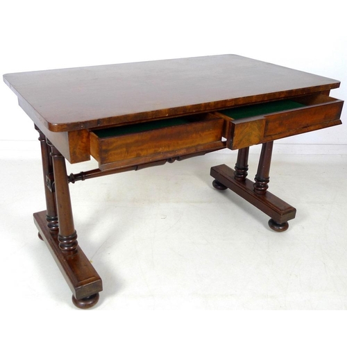 931A - An early Victorian mahogany desk, two frieze drawers, turned column supports and stretcher, glass pr... 