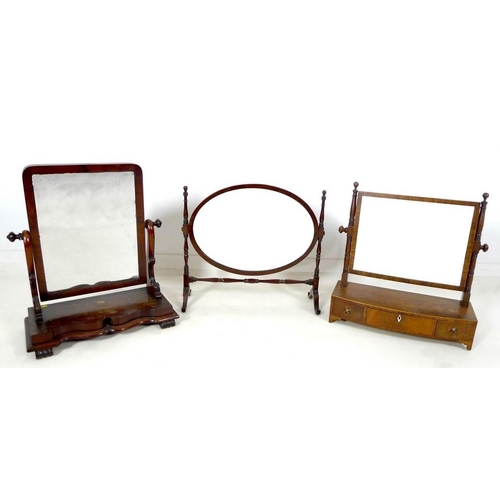 934 - A group of three 19th century mahogany toilet mirrors, comprising Georgian rectangular plate mirror ... 