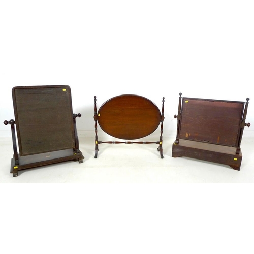 934 - A group of three 19th century mahogany toilet mirrors, comprising Georgian rectangular plate mirror ... 