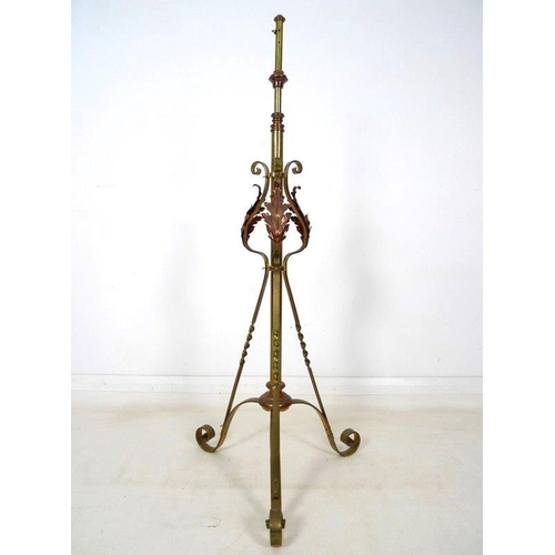 937A - An early 20th century Arts and Crafts brass and copper standard lamp stand, in the manner of W.A. Be... 