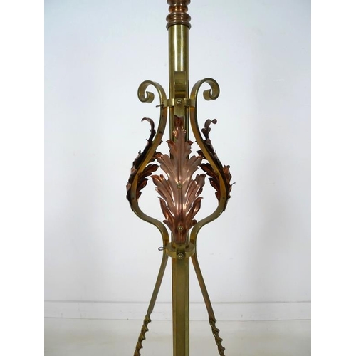 937A - An early 20th century Arts and Crafts brass and copper standard lamp stand, in the manner of W.A. Be... 