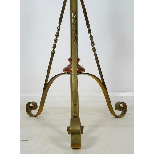 937A - An early 20th century Arts and Crafts brass and copper standard lamp stand, in the manner of W.A. Be... 